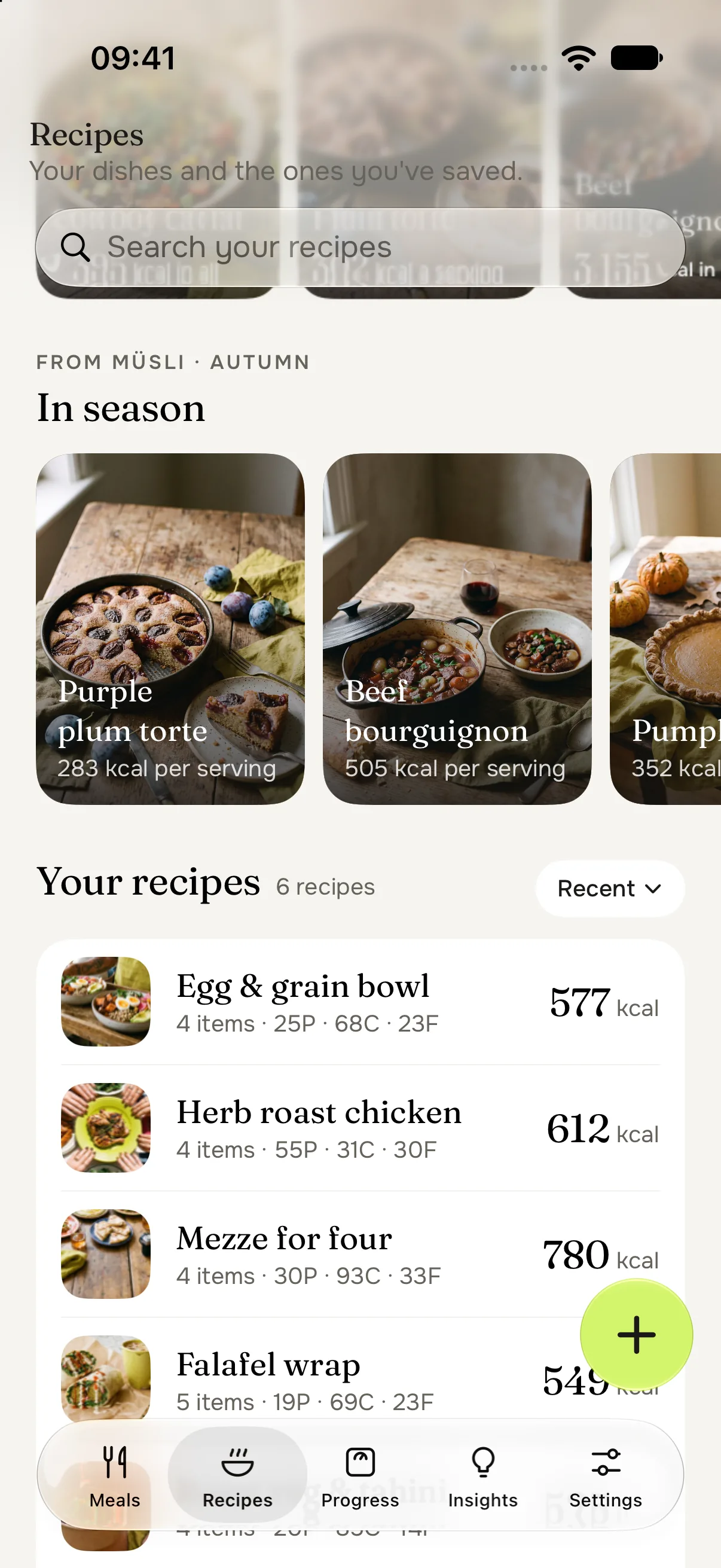 The Recipes tab scrolled to In season picks from Müsli and Your recipes, six recipes with photos: egg and grain bowl 577 kcal, herb roast chicken 612 kcal, mezze for four 780 kcal, falafel wrap 549 kcal